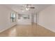 Bright, open living area features neutral paint, tile flooring, and ample natural light at 11538 W Windrose Ave, El Mirage, AZ 85335