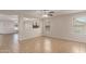 Bright, open living area features neutral paint, tile flooring, and ample natural light at 11538 W Windrose Ave, El Mirage, AZ 85335