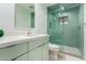 Modern bathroom featuring a sleek vanity, glass shower and contemporary fixtures at 12423 N 64Th St, Scottsdale, AZ 85254