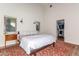 Bright bedroom features natural light, a walk-in closet, and modern fixtures at 12423 N 64Th St, Scottsdale, AZ 85254