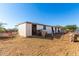 Horse stalls with metal fencing and a clear blue sky above at 12423 N 64Th St, Scottsdale, AZ 85254