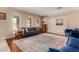 Comfortable living area with bright windows and stylish decor exudes a welcoming ambiance at 12423 N 64Th St, Scottsdale, AZ 85254