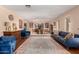 Spacious living room boasts hardwood floors and dining area, perfect for entertaining at 12423 N 64Th St, Scottsdale, AZ 85254