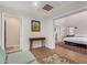 Serene sitting area leads to primary suite and features natural light at 12423 N 64Th St, Scottsdale, AZ 85254