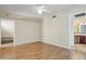 Bright bonus room with hardwood floors, a ceiling fan, and a bonus area at 1342 W Emerald Ave # 286, Mesa, AZ 85202