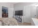 Bedroom featuring a TV, a wardrobe and neutral color palette at 1547 W Lacewood W Pl, Phoenix, AZ 85045