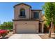 Charming two-story home with a neutral color palette, well-manicured landscaping, and a two car garage at 1547 W Lacewood W Pl, Phoenix, AZ 85045