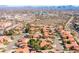 Aerial view of the community with a pool and palm trees under a clear blue sky at 16233 E Rosetta Dr # 47, Fountain Hills, AZ 85268