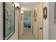 Hallway showing art and doors leading to other rooms in the house at 16233 E Rosetta Dr # 47, Fountain Hills, AZ 85268