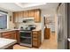 Well-equipped kitchen with modern appliances, and wooden cabinets, designed for efficiency and style at 16233 E Rosetta Dr # 47, Fountain Hills, AZ 85268