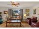 Inviting living room with comfortable seating, stylish decor, and a bright view of the outdoor landscape at 16233 E Rosetta Dr # 47, Fountain Hills, AZ 85268