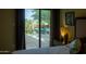 Bedroom view through sliding glass door, showing outdoor patio space at 16233 E Rosetta Dr # 47, Fountain Hills, AZ 85268