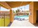 View from the outdoor patio overlooking a community pool and palm trees at 16233 E Rosetta Dr # 47, Fountain Hills, AZ 85268