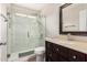Updated bathroom featuring a glass shower and modern fixtures at 1653 E Gail Dr, Chandler, AZ 85225