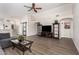 Spacious living room featuring wood floors, high ceilings, and natural light at 1653 E Gail Dr, Chandler, AZ 85225
