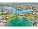 Stunning aerial view of a lakeside community with lush green spaces and beautiful waterfront homes at 16622 S 32Nd Pl, Phoenix, AZ 85048
