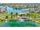 Scenic aerial view of the community lake, featuring a waterfront park with a playground at 16622 S 32Nd Pl, Phoenix, AZ 85048