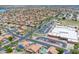 Neighborhood close to commercial buildings, with orange tiled roofs, swimming pools, and verdant trees at 16622 S 32Nd Pl, Phoenix, AZ 85048