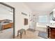 Bathroom featuring a glass shower, soaking tub, vanity, and peek into the bedroom at 16622 S 32Nd Pl, Phoenix, AZ 85048
