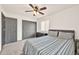 Comfortable bedroom with carpet, ceiling fan, and a closet at 16622 S 32Nd Pl, Phoenix, AZ 85048