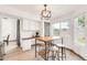 Practical dining area near the kitchen with counter-height table & chairs for easy meal prep and eating at 16622 S 32Nd Pl, Phoenix, AZ 85048