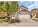 Inviting single-Gathering home with mature landscaping, a spacious driveway, and a convenient two-car garage at 16622 S 32Nd Pl, Phoenix, AZ 85048
