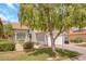 Charming single-Gathering home with a mature shade tree, lush lawn, and a well-maintained front yard landscape at 16622 S 32Nd Pl, Phoenix, AZ 85048