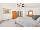 Bedroom featuring wood furniture and a large window at 16622 S 32Nd Pl, Phoenix, AZ 85048
