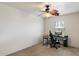 Bright room with a computer and gaming setup, filled with ample natural light at 18222 W Lundberg St, Surprise, AZ 85388