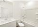 Contemporary bathroom featuring a combination tub and shower, as well as a modern sink at 19390 N Fiano Dr, Maricopa, AZ 85138