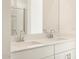 Bathroom features double sinks with a mirror above and a glass enclosed shower at 19390 N Fiano Dr, Maricopa, AZ 85138