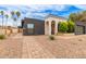 Charming single-story home featuring unique architectural details and desert landscaping, a modern garage door and drought tolerant plantings at 2033 E Janice Way, Phoenix, AZ 85022