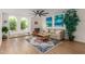 Bright and airy living room with modern decor and large windows at 2033 E Janice Way, Phoenix, AZ 85022