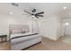 Serene main bedroom with a plush bed, ample closet space, and a connecting bathroom at 2033 E Janice Way, Phoenix, AZ 85022