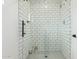 The shower features a white subway tile with a mosaic tile floor and a glass door at 2033 E Janice Way, Phoenix, AZ 85022