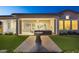 Outdoor oasis featuring a covered patio, seamless indoor-outdoor flow, and a serene fountain feature at 20797 W Rattler Rd, Buckeye, AZ 85396