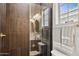Elegant bathroom with a walk-in shower, stylish vanity, and ample natural light at 20797 W Rattler Rd, Buckeye, AZ 85396