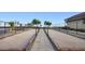 Two bocce ball courts in pristine condition with well-manicured landscaping at 20797 W Rattler Rd, Buckeye, AZ 85396
