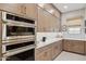 Kitchen featuring built-in stainless steel appliances and ample cabinet space at 20797 W Rattler Rd, Buckeye, AZ 85396