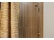 Elegant shower featuring designer curtain and wood look ceramic tiles at 20797 W Rattler Rd, Buckeye, AZ 85396
