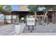 The Vic Bar + Kitchen at the Victory Club entry with fireplace and patio at 20797 W Rattler Rd, Buckeye, AZ 85396