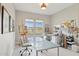 Studio with ample natural light and creative art supplies at 20797 W Rattler Rd, Buckeye, AZ 85396
