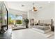 Spacious bedroom features bright windows, comfortable seating, and stylish decor at 21240 N 74Th Pl, Scottsdale, AZ 85255