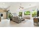 Bright and open living room featuring large windows and backyard views at 21240 N 74Th Pl, Scottsdale, AZ 85255