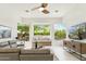 Bright and open living room featuring a built-in bench and backyard views at 21240 N 74Th Pl, Scottsdale, AZ 85255