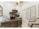 Bright and spacious office with a large desk and modern decor at 21240 N 74Th Pl, Scottsdale, AZ 85255