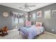 Charming bedroom with gray walls, a soft color palette, and cheerful decor at 2150 W Alameda Rd # 1313, Phoenix, AZ 85085