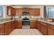 Well-equipped kitchen features stainless steel appliances, granite countertops, and ample cabinet space at 2150 W Alameda Rd # 1313, Phoenix, AZ 85085
