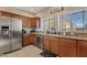 Spacious kitchen features stainless steel appliances, granite countertops, and ample cabinet space at 2150 W Alameda Rd # 1313, Phoenix, AZ 85085
