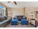 Spacious living room featuring comfortable seating, a neutral color palette, and a decorative fireplace at 2150 W Alameda Rd # 1313, Phoenix, AZ 85085